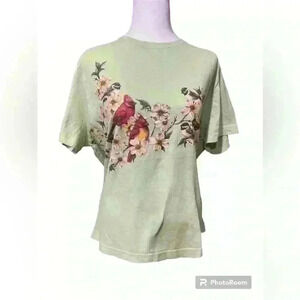 Casual short sleeve shirt. Green with flowers and birds.